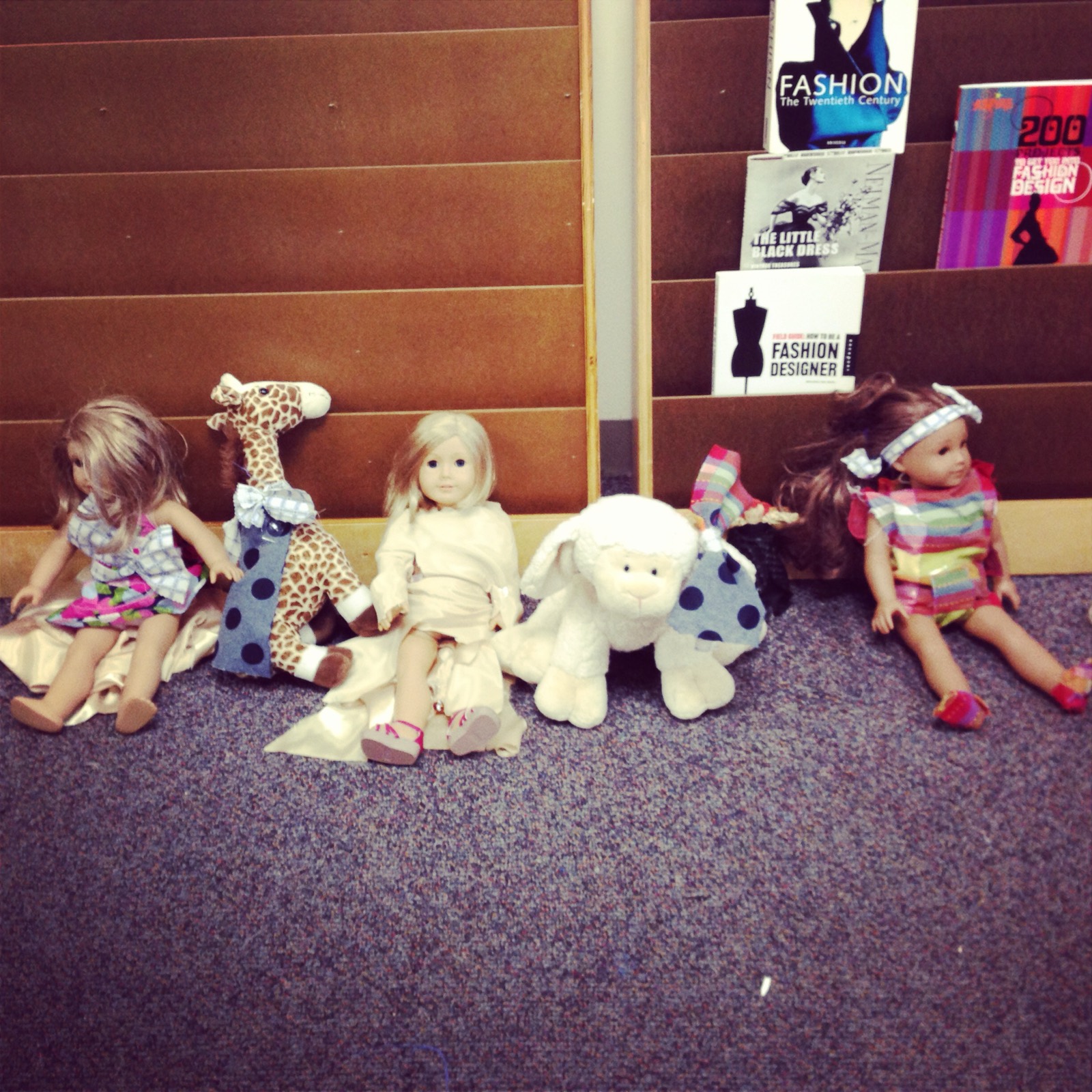 Dolls & dresses made in a sewing lesson