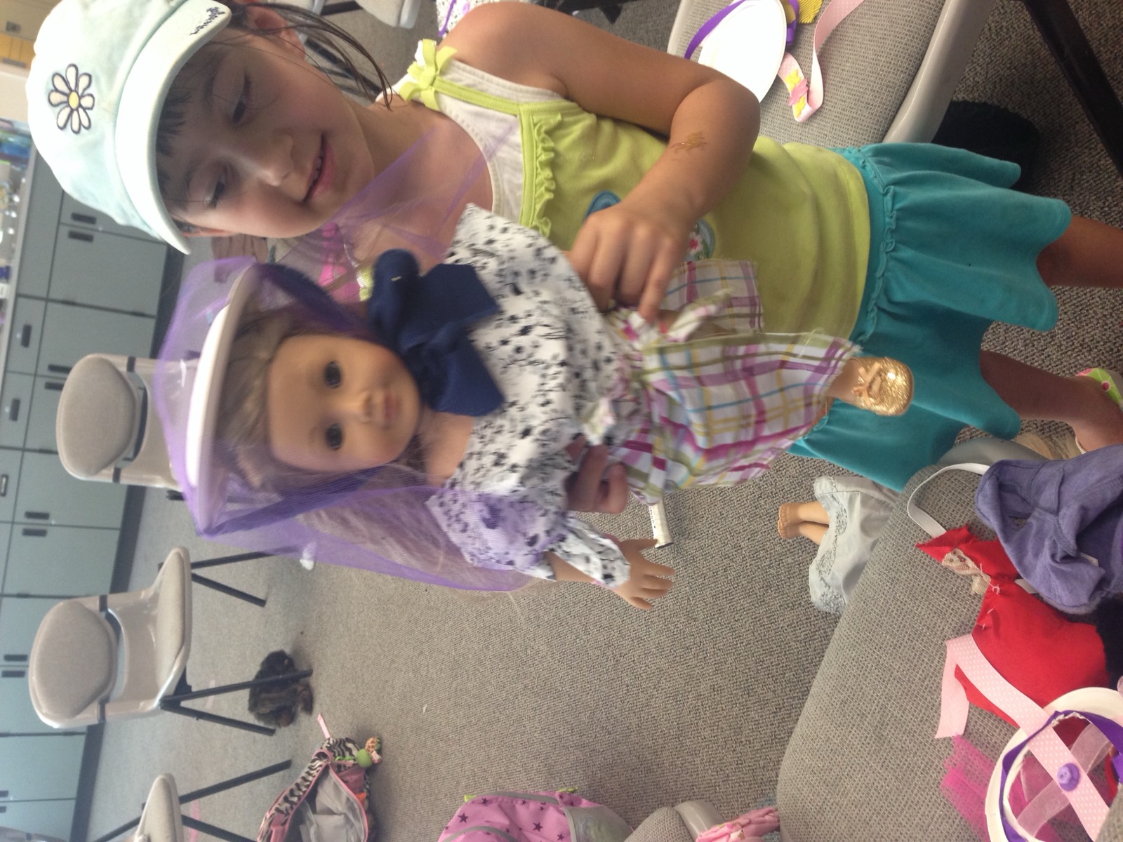 Dolls & dresses made in a sewing lesson