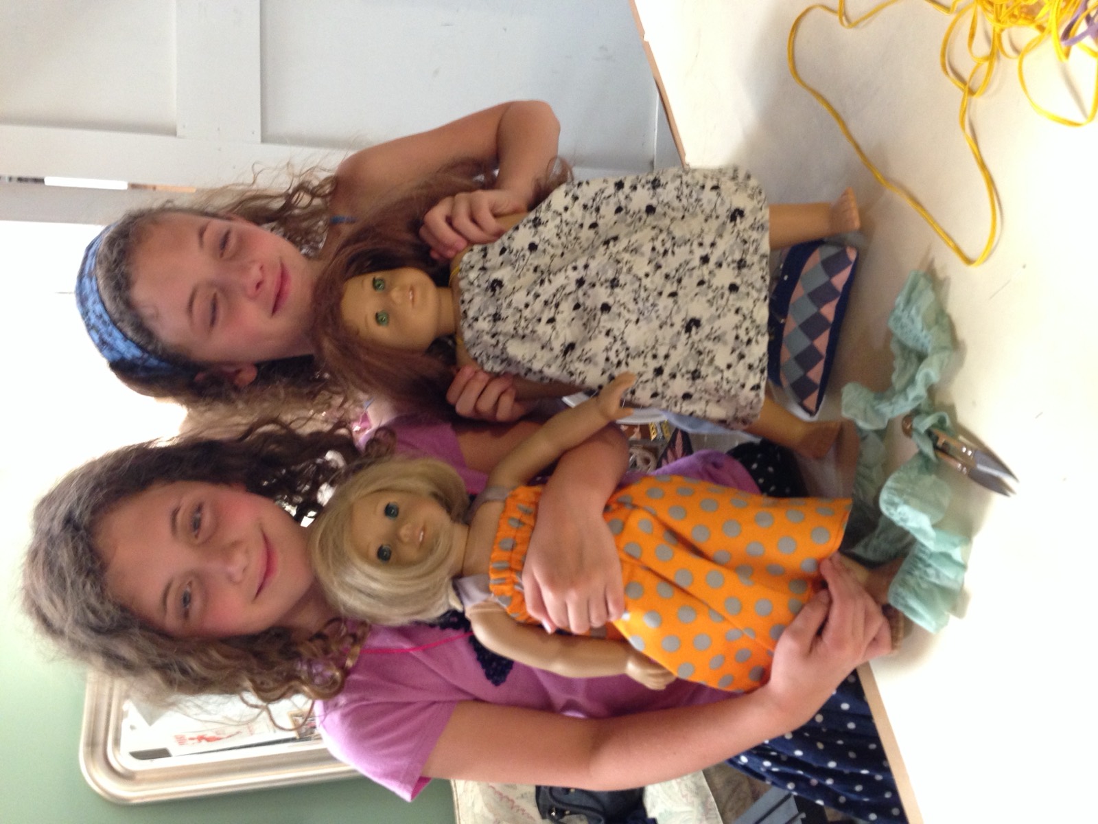 Dolls & dresses made in a sewing lesson